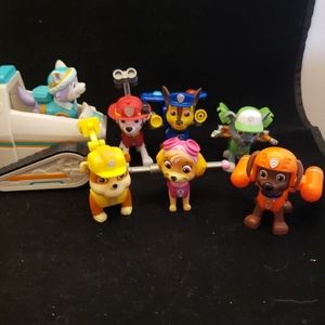 Paw patrol figures and 1 vehicle. Most have the special button to activate